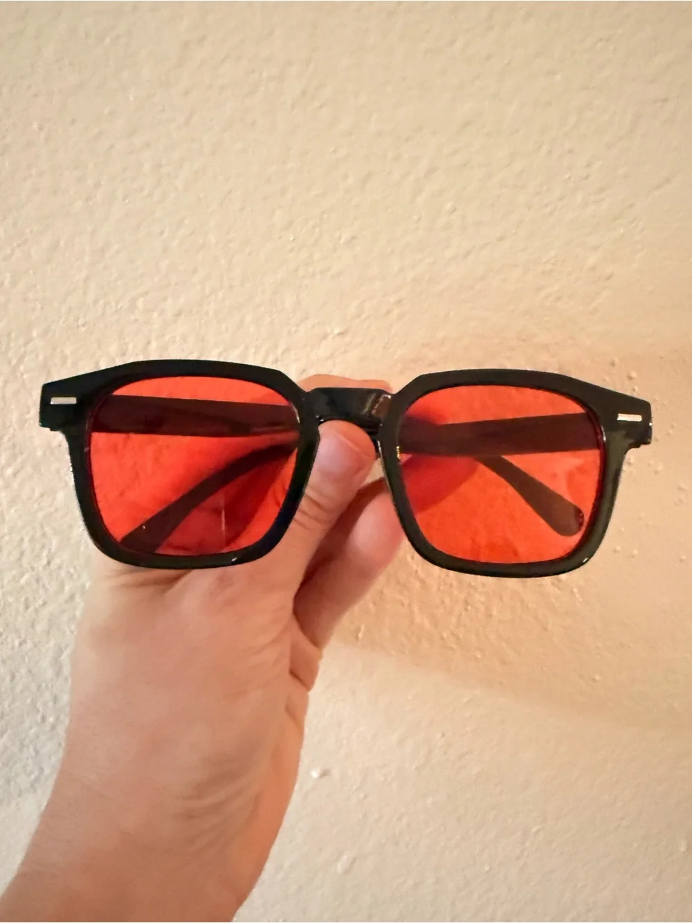 glasses with red lenses